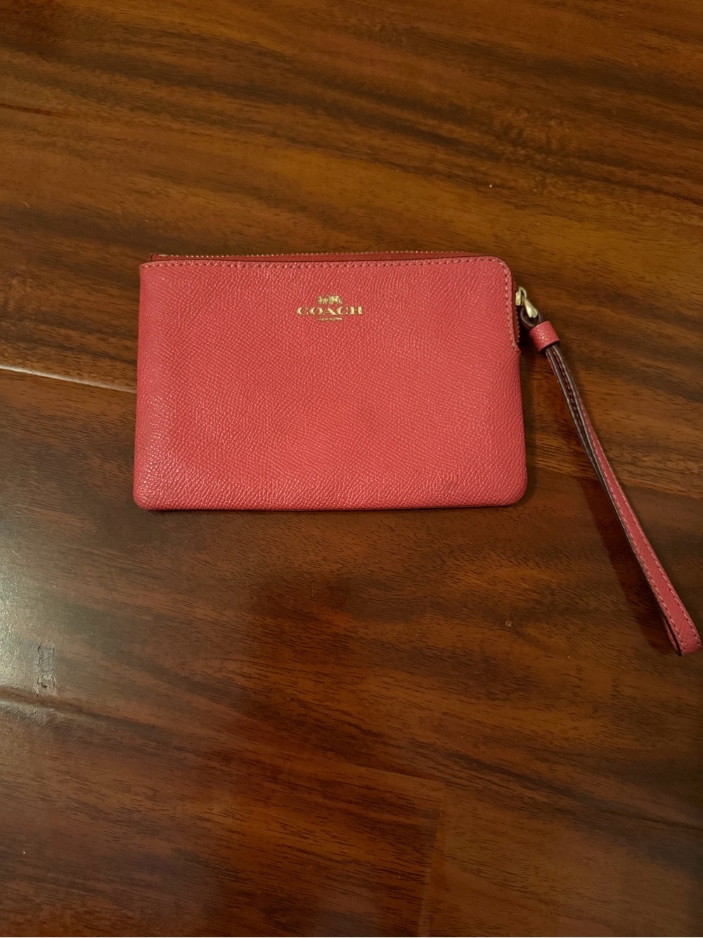 Coach Coral Pink Leather Wristlet with Gold Logo